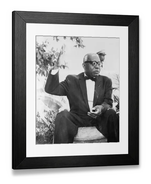 Framed Print : Francoise Duvalier Seated in Chair Framed Print : Francoise Duvalier Seated in Chair