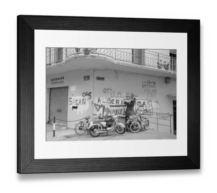 Framed Print : Man Writes French OAS Grafitti on Wall Framed Print : Man Writes French OAS Grafitti on Wall