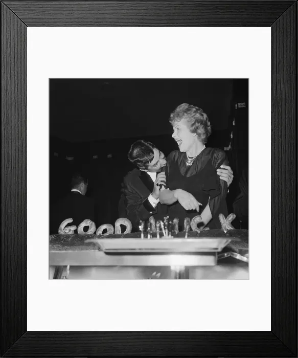 Framed Print : Jerry Lewis Bites Lucille Ball on Arm Framed Print : Jerry Lewis Bites Lucille Ball on Arm