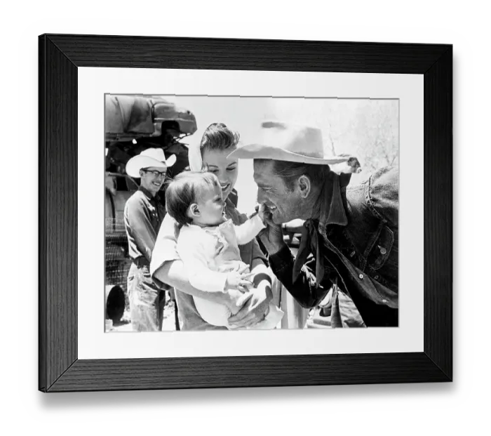 Framed Print : Kirk Douglas with Infant Framed Print : Kirk Douglas with Infant