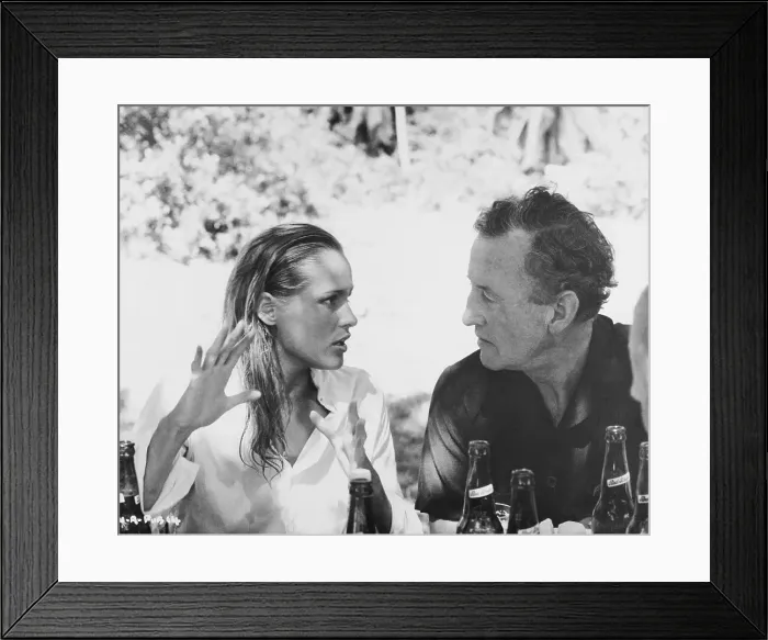 Framed Print : Ian Fleming Chatting with Ursula Andress Framed Print : Ian Fleming Chatting with Ursula Andress