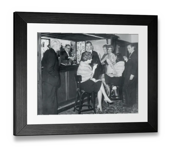 Framed Print : Playboy Club Members Drinking at Bar Framed Print : Playboy Club Members Drinking at Bar