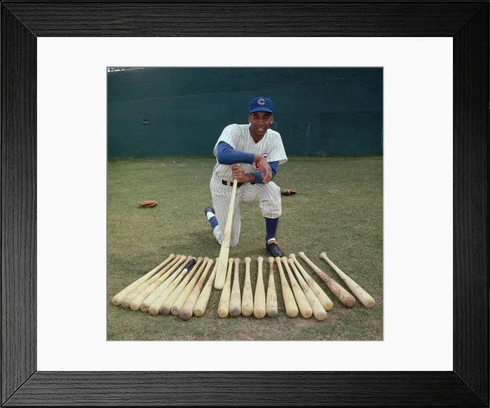 Framed Print : Ernie Banks Kneeling Behind Row of Bats
