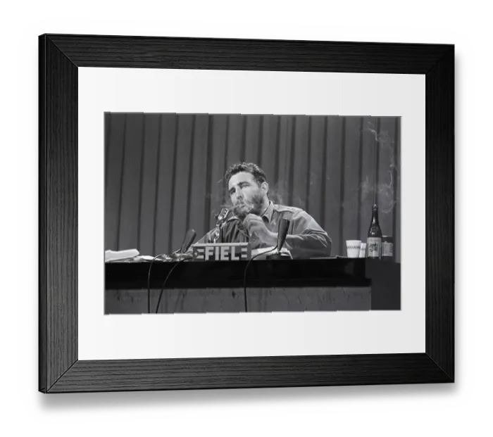 Framed Print : Fidel Castro Lights a Cigar Framed Print : Fidel Castro Lights a Cigar