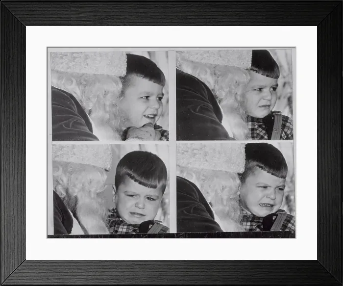 Framed Print : Boy's Facial Changes While on Santa's Knee Framed Print : Boy's Facial Changes While on Santa's Knee