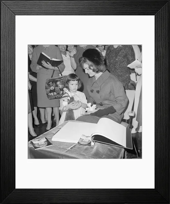 Framed Print : Jacqueline Kennedy Giving an Ornament to a Young Girl Framed Print : Jacqueline Kennedy Giving an Ornament to a Young Girl