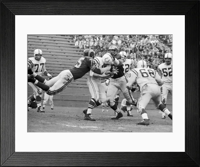 Framed Print : Quarterback Johnny Unitas Runs Through the Rams Defense Framed Print : Quarterback Johnny Unitas Runs Through the Rams Defense