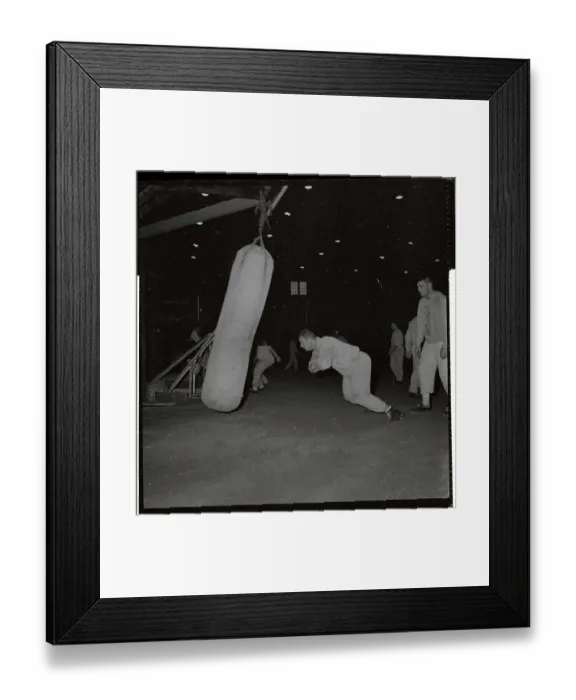 Framed Print : Tom Brown Hitting Bags