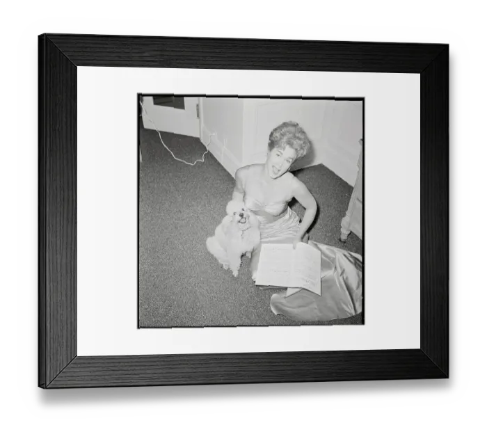 Framed Print : Sheila Reynolds Sitting with Music Score and Pet Poodle Framed Print : Sheila Reynolds Sitting with Music Score and Pet Poodle