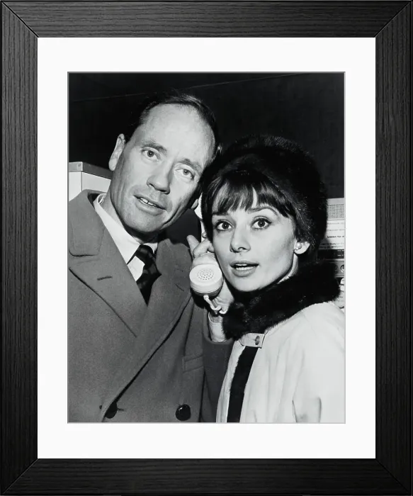 Framed Print : Audrey Hepburn and Mel Ferrer Sharing Telephone