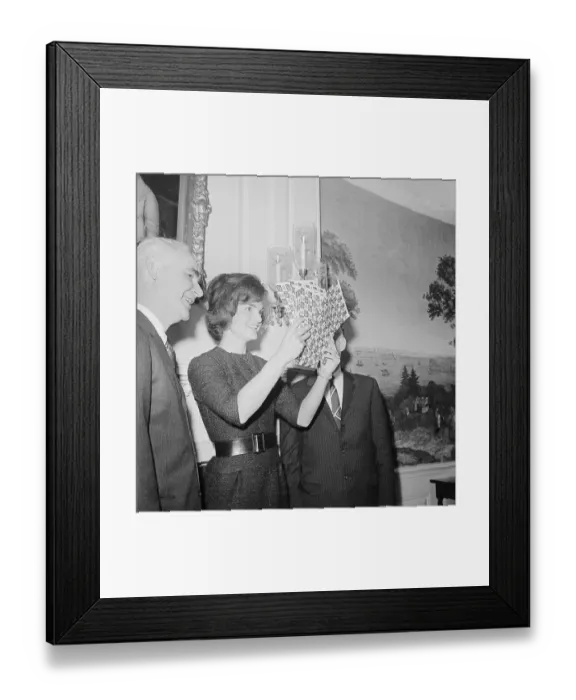 Framed Print : Jacqueline Kennedy Looking at Christmas Seals Framed Print : Jacqueline Kennedy Looking at Christmas Seals