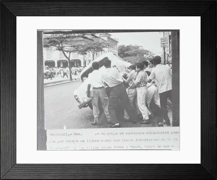 Framed Print : Students Overturning Car Framed Print : Students Overturning Car