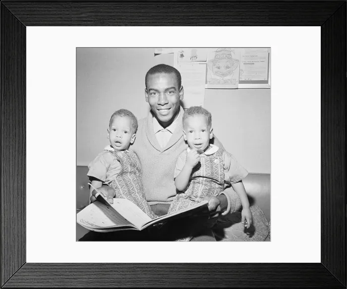 Framed Print : Ernie Banks Reading to His Twin Sons Framed Print : Ernie Banks Reading to His Twin Sons