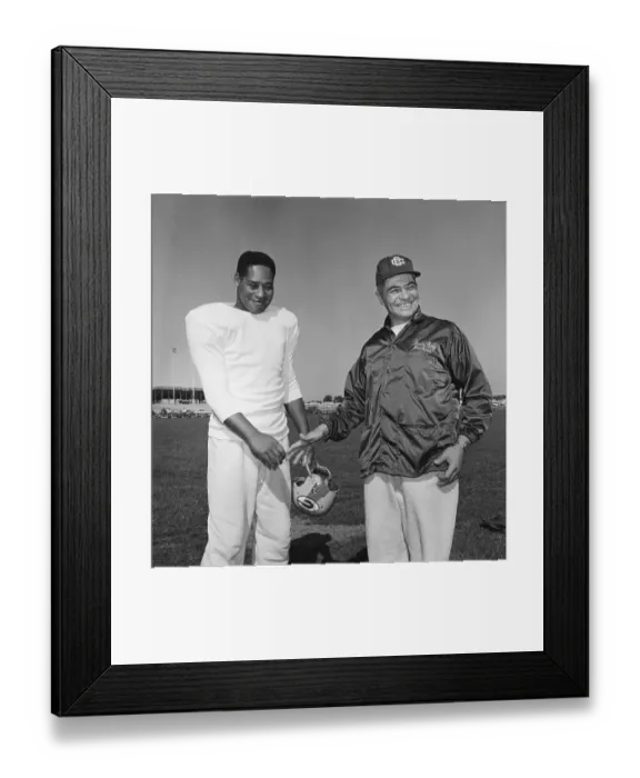 Framed Print : Em Tunnell Shaking Hands With Vince Lombardi Framed Print : Em Tunnell Shaking Hands With Vince Lombardi