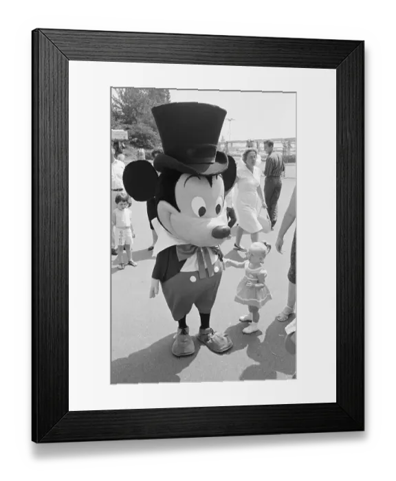 Framed Print : Girl Pausing with Mickey at Disneyland Framed Print : Girl Pausing with Mickey at Disneyland