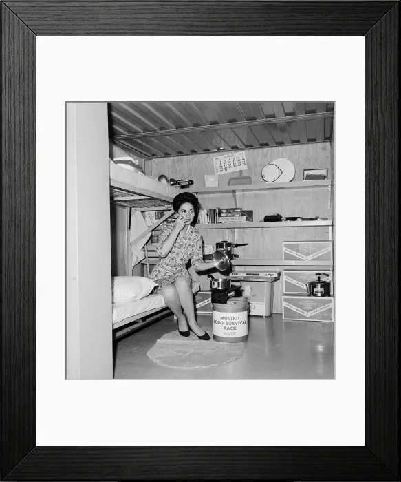 Framed Print : Woman Sits in Air Raid Shelter Framed Print : Woman Sits in Air Raid Shelter