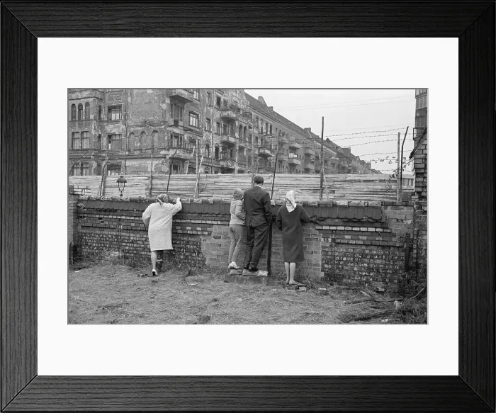 Framed Print : People Look Over Barb Wire at Berlin Wall Framed Print : People Look Over Barb Wire at Berlin Wall