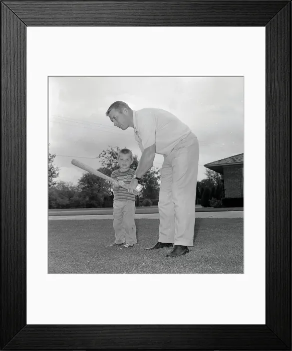 Framed Print : Mickey Mantle Holding Bat with Son