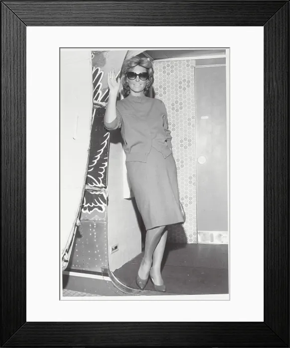Framed Print : Singer Julie London Waving from Airplane Framed Print : Singer Julie London Waving from Airplane