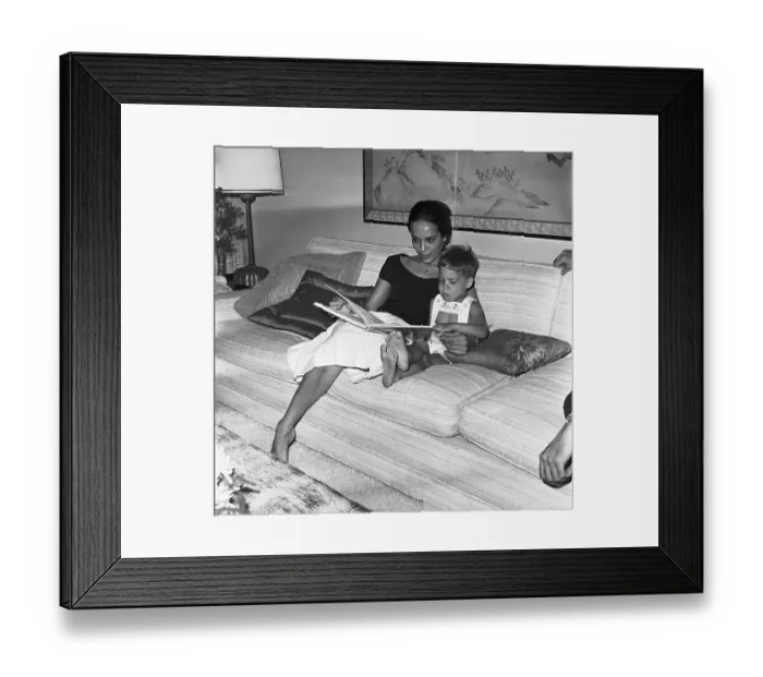 Framed Print : Anna Kashfi Reading to Christian Brando Framed Print : Anna Kashfi Reading to Christian Brando