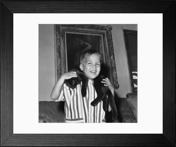 Framed Print : Christian Brando Playing with a Cat