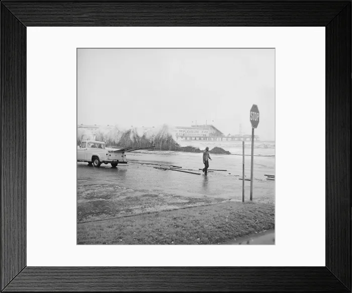 Framed Print : Man On Beach Near Large Breaking Waves Framed Print : Man On Beach Near Large Breaking Waves