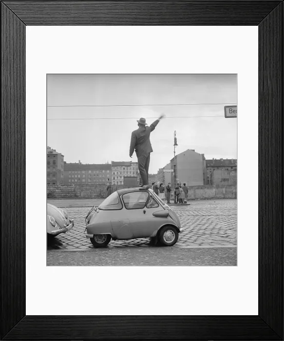 Framed Print : West Berliner Waving to East Berliners Framed Print : West Berliner Waving to East Berliners