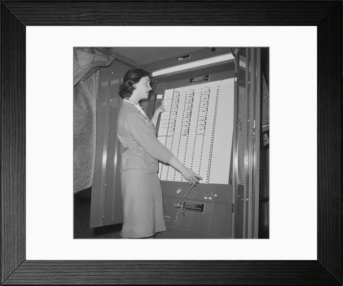 Framed Print : Woman Demonstrating Voting Machine Framed Print : Woman Demonstrating Voting Machine