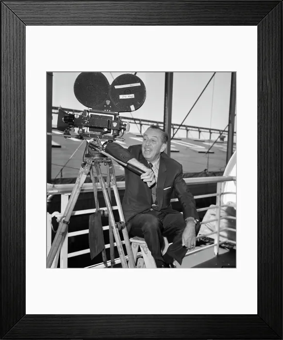 Framed Print : Animator Walt Disney with Movie Camera Framed Print : Animator Walt Disney with Movie Camera