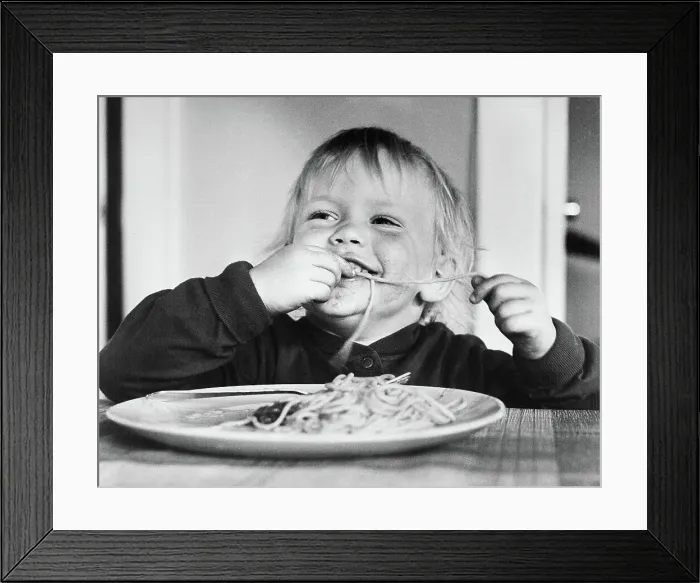 Framed Print : Baby Girl Eating Spaghetti Framed Print : Baby Girl Eating Spaghetti