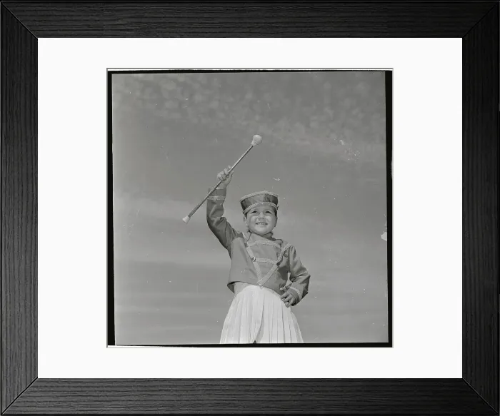 Framed Print : Little Girl Holding Baton in Air Framed Print : Little Girl Holding Baton in Air