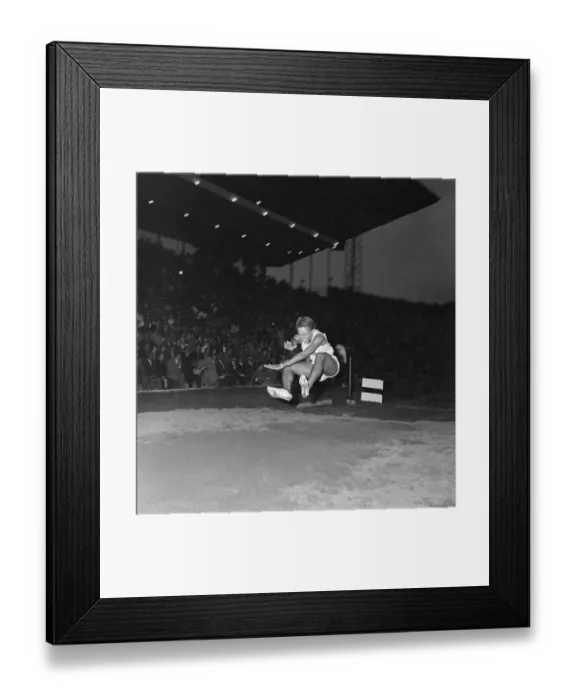Framed Print : Willie White Breaking Broad Jump Record Framed Print : Willie White Breaking Broad Jump Record