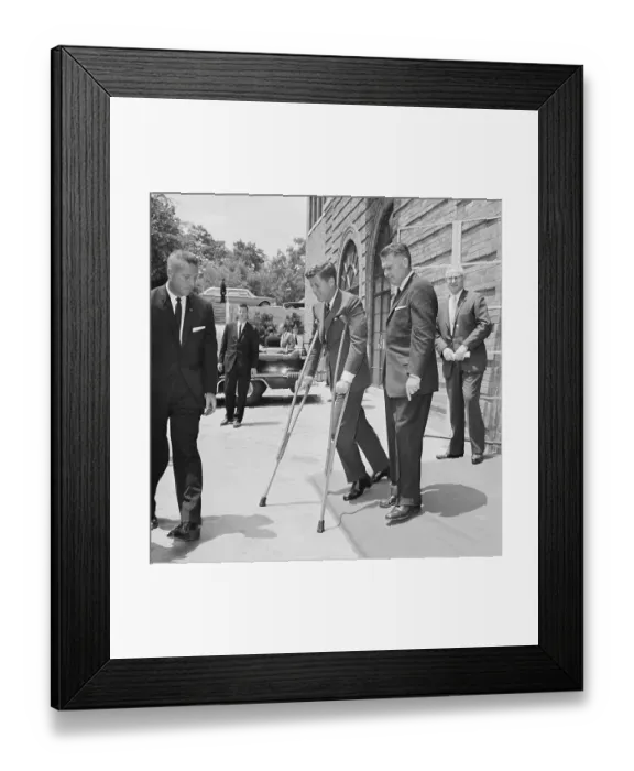 Framed Print : President Kennedy Walking With Crutches Framed Print : President Kennedy Walking With Crutches
