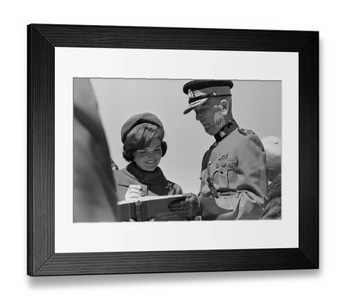 Framed Print : Jacqueline Kennedy Signing a Visitor's Book