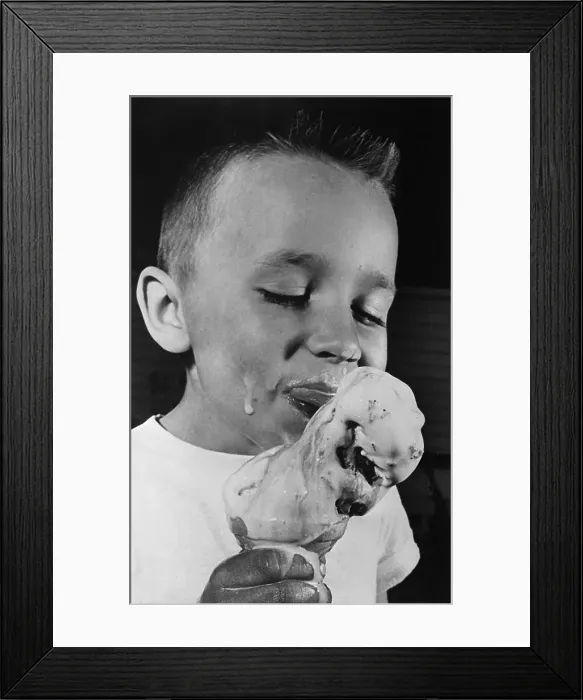 Framed Print : Close Up of Boy Eating Melting Ice Cream Cone Framed Print : Close Up of Boy Eating Melting Ice Cream Cone