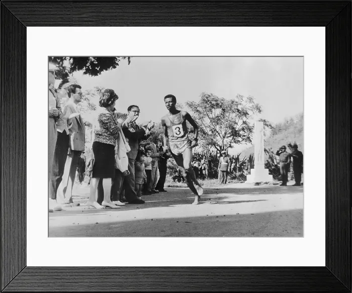 Framed Print : Abebe Bikilla Running in Marathon