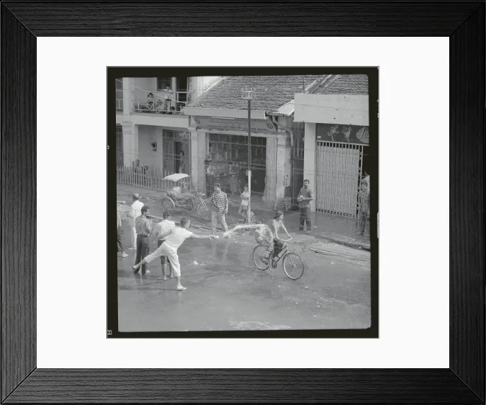 Framed Print : Pedestrians Getting Wet on Wetting Holiday Framed Print : Pedestrians Getting Wet on Wetting Holiday