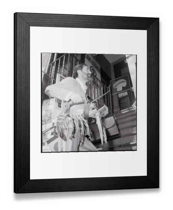 Framed Print : Man Carrying Lobster Like A Suitcase Framed Print : Man Carrying Lobster Like A Suitcase