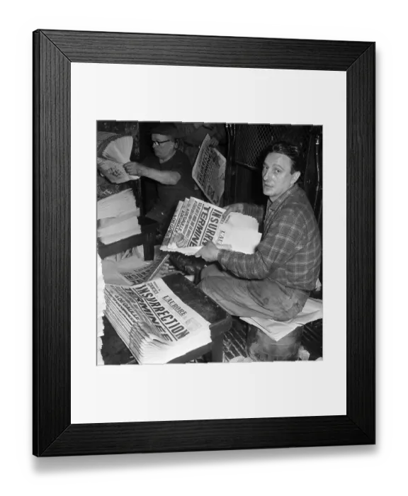 Framed Print : Worker Holding Newspaper Announcing Insurrection Terminated Framed Print : Worker Holding Newspaper Announcing Insurrection Terminated