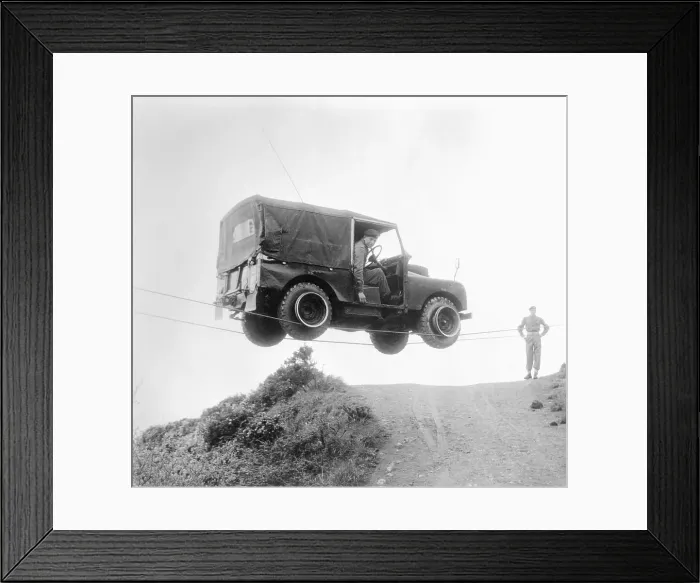 Framed Print : Jeep Traveling on Wires Framed Print : Jeep Traveling on Wires