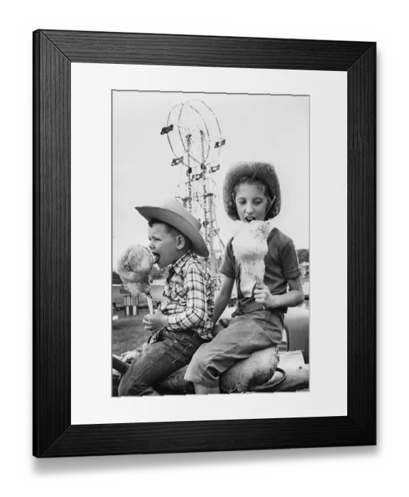 Framed Print : Boy and Girl Eating Cotton Candy Framed Print : Boy and Girl Eating Cotton Candy