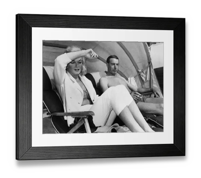 Framed Print : DiMaggio and Monroe Lounging on Beach in Florida Framed Print : DiMaggio and Monroe Lounging on Beach in Florida