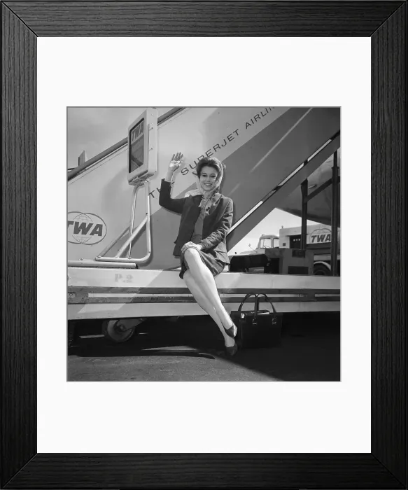 Framed Print : Jane Fonda Sitting by Airplane Framed Print : Jane Fonda Sitting by Airplane
