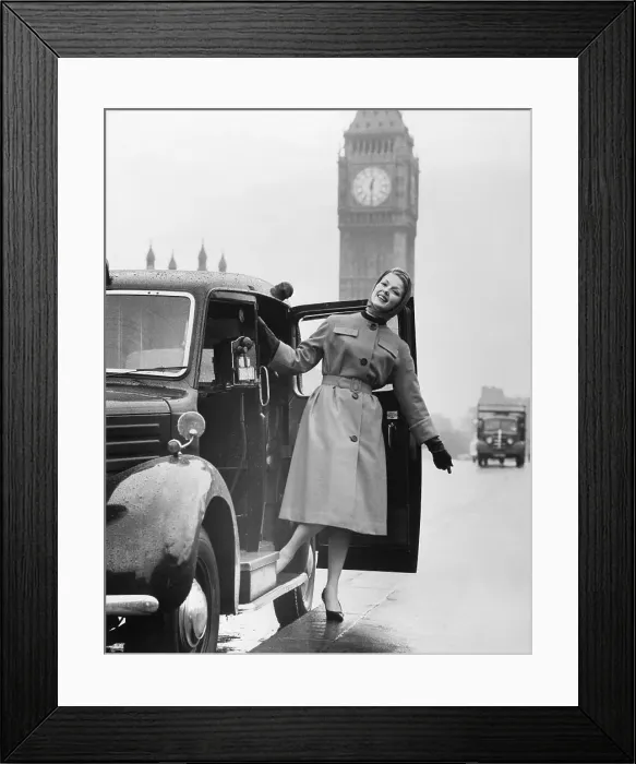 Framed Print : Adele Lawrence Models Raincoat By Car Framed Print : Adele Lawrence Models Raincoat By Car