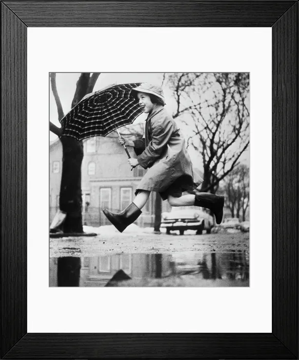 Framed Print : Girl Leaping over Mud Puddle Framed Print : Girl Leaping over Mud Puddle