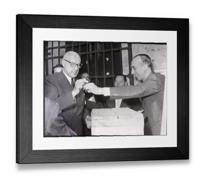 Framed Print : Man Handing Jorge Allessandri a Pencil Framed Print : Man Handing Jorge Allessandri a Pencil