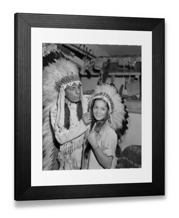 Framed Print : Iron Eyes Cody Putting Headdress on Nancy Kwan Framed Print : Iron Eyes Cody Putting Headdress on Nancy Kwan