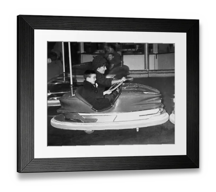 Framed Print : Liz Taylor and Son Michael Riding in Bumper Car Framed Print : Liz Taylor and Son Michael Riding in Bumper Car