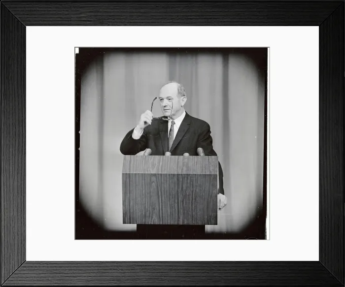 Framed Print : Dean Rusk Holding Eyeglasses at Podium Framed Print : Dean Rusk Holding Eyeglasses at Podium