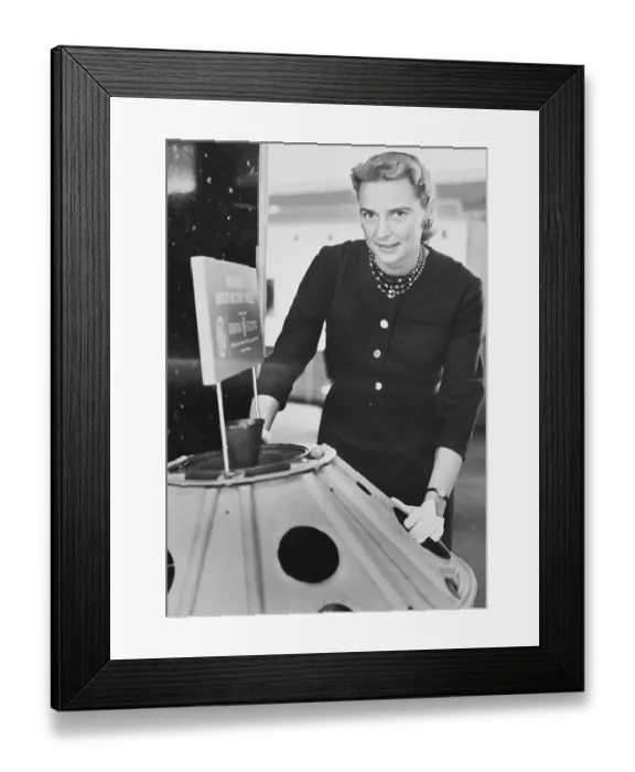Framed Print : Jerrie Cobb Standing Near Satellite Model Framed Print : Jerrie Cobb Standing Near Satellite Model